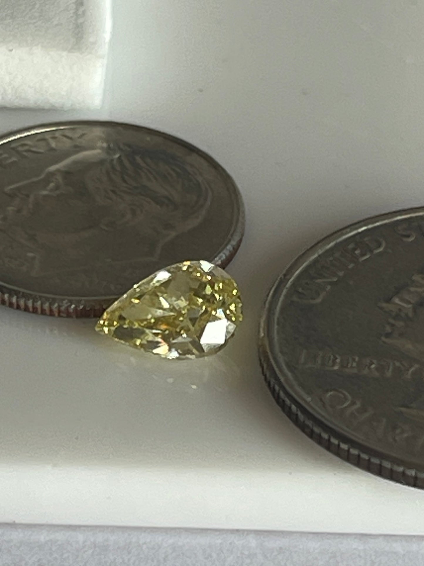 Fancy intance Yellow 1.00 carat pear shape Diamond